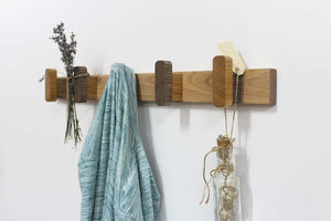 Wooden hanger with clothes